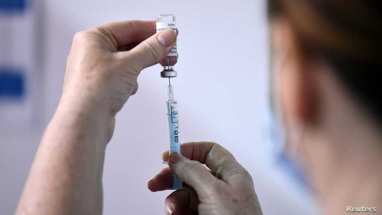 Medical staff member prepares a shot of the AstraZeneca COVID-19 vaccine at SSE Arena which opened this morning and will operate as a mega regional vaccination centre in Belfast, Northern Ireland March 29, 2021. REUTERS/Clodagh Kilcoyne