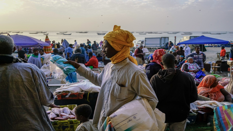NOUAKCHOTT, MAURITANIA - DECEMBER 31: A plastic bag seller hawks his illegal wares at the fish market of Nouakchott, Mauritania. Mauritania outlawed plastic bags for environmental reasons but the bags are still popular for other reasons. (David Degner/Getty Images)