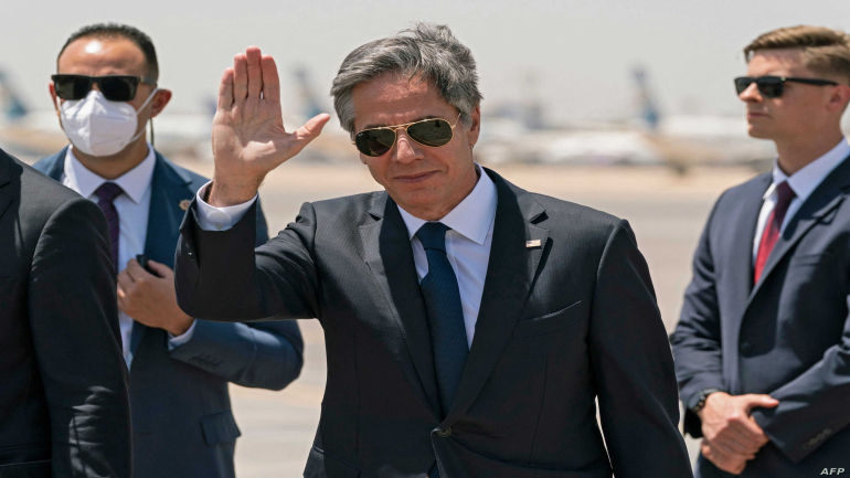 US Secretary of State Antony Blinken waves as he arrives in Cairo on May 26, 2021. (Photo by Alex Brandon / POOL / AFP)