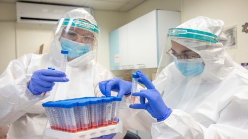 Health care workers take test samples of Israelis to check if they have been infected with the Coronavirus, in Modiin Illit, on July 29, 2020. Photo by Yossi Aloni/FLASH90 *** Local Caption *** ????? ?????? ???? ????? ?????? ?????