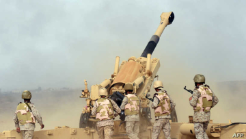 Saudi soldiers from an artillery unit fire shells towards Yemen from a post close to the Saudi-Yemeni border, in southwestern Saudi Arabia, on April 13, 2015. Saudi Arabia is leading a coalition of several Arab countries which since March 26 has carried out air strikes against the Shiite Huthis rebels, who overran the capital Sanaa in September and have expanded to other parts of Yemen. AFP PHOTO / FAYEZ NURELDINE / AFP PHOTO / FAYEZ NURELDINE