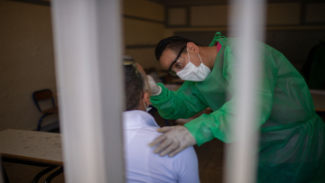 RABAT, MOROCCO - MAY 28: A medical worker takes a swab sample from a taxi driver as part of the novel coronavirus (COVID-19) testing at Moulay Abdellah Hospital in Morocco's capital Rabat on May 28, 2020. (Photo by Jalal Morchidi/Anadolu Agency via Getty Images)