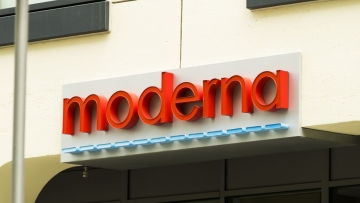 Signage is displayed on the Moderna Inc. headquarters in Cambridge, Massachusetts, U.S., on Monday, May 25, 2020. An experimental coronavirus vaccine from Moderna Inc. may wind up being “good enough” to be the first authorized inoculation, but is unlikely to be the best, an Evercore ISI analyst said. Photographer: Adam Glanzman/Bloomberg