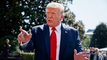Mandatory Credit: Photo by Evan Vucci/AP/Shutterstock (10358411u)
President Donald Trump talks to reporters on the South Lawn of the White House, in Washington, as he prepares to leave Washington for his annual August holiday at his New Jersey golf club
Trump, Washington, USA - 09 Aug 2019