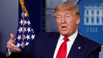 Mandatory Credit: Photo by Alex Brandon/AP/Shutterstock (10602083e)
President Donald Trump speaks about the coronavirus in the James Brady Press Briefing Room of the White House, in Washington
Virus Outbreak Trump, Washington, United States - 03 Apr 2020