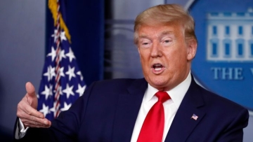 Mandatory Credit: Photo by Alex Brandon/AP/Shutterstock (10602083e) President Donald Trump speaks about the coronavirus in the James Brady Press Briefing Room of the White House, in Washington Virus Outbreak Trump, Washington, United States - 03 Apr 2020