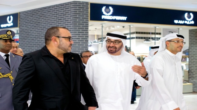 ABU DHABI, UNITED ARAB EMIRATES - October 29, 2013: HH General Sheikh Mohamed bin Zayed Al Nahyan Crown Prince of Abu Dhabi Deputy Supreme Commander of the UAE Armed Forces (C), and His Majesty King Mohammed VI of Morocco (L), tour The Galleria shopping mall at Sowwah Square on Al Maryah Island, after the opening ceremony. Seen with HE Khaldoon Khalifa Al Mubarak CEO and Managing Director Mubadala and Chairman of the Executive Affairs Authority (R).
( Ryan Carter / Crown Prince Court - Abu Dhabi )
---