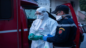 RABAT, MOROCCO - APRIL 01: A medical worker wearing protective suit prepares to transport a suspected case of the new type of coronavirus (COVID-19) in Rabat, Morocco on April 01, 2020. ( Jalal Morchidi - Anadolu Agency )