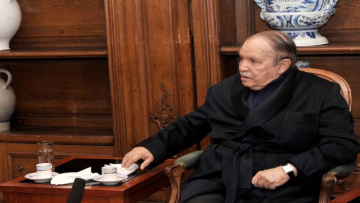 A photo obtained on June 12, 2013 from Algerian Press Service (APS) news agency shows Algeria's President Abdelaziz Bouteflika sitting during a meeting with Algeria's Prime Minister and Chief of Staff in a Paris hospital on June 11, 2013 in one of the first pictures to emerge since he was hospitalised in France in April after a mini-stroke. Pictures of Bouteflika were published by the APS to dispel rumours circulating in both Algiers and Paris about the 76-year-old president's condition deteriorating. AFP PHOTO / APS / STR