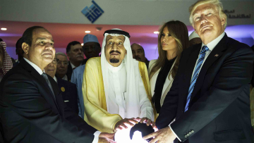 RIYADH, SAUDI ARABIA - MAY 21: (----EDITORIAL USE ONLY MANDATORY CREDIT - "BANDAR ALGALOUD / SAUDI ROYAL COUNCIL / HANDOUT" - NO MARKETING NO ADVERTISING CAMPAIGNS - DISTRIBUTED AS A SERVICE TO CLIENTS----)US President Donald Trump, US First lady Melania Trump (2nd R), Saudi Arabia's King Salman bin Abdulaziz al-Saud (2nd L) and Egyptian President Abdel Fattah el-Sisi (L) put their hands on an illuminated globe during the inauguration ceremony of the Global Center for Combating Extremist Ideology in Riyadh, Saudi Arabia on May 21, 2017. (Photo by Bandar Algaloud / Saudi Royal Council / Handout/Anadolu Agency/Getty Images)